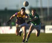 2 February 2025; Páiric Hughes of Wexford in action against Tony McCarthy of Limerick during the Allianz Football League Division 4 match between Limerick and Wexford at Mick Neville Park in Rathkeale, Limerick. Photo by Tom Beary/Sportsfile