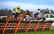 2 February 2025; Lossiemouth, with Danny Mullins up, leads eventual winner State Man, with Paul Townend up, over the last 'first time round' during the The Irish Champion Hurdle during day two of the Dublin Racing Festival at Leopardstown Racecourse in Dublin. Photo by Shauna Clinton/Sportsfile