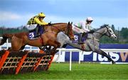 2 February 2025; Lossiemouth, with Danny Mullins up, leads eventual winner State Man, with Paul Townend up, over the last 'first time round' during the The Irish Champion Hurdle during day two of the Dublin Racing Festival at Leopardstown Racecourse in Dublin. Photo by Shauna Clinton/Sportsfile