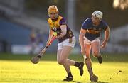 2 February 2025; Simon Donohoe of Wexford in action against Darragh McCarthy of Tipperary during the Allianz Hurling League Division 1A match between Tipperary and Wexford at FBD Semple Stadium in Thurles, Tipperary. Photo by Brendan Moran/Sportsfile