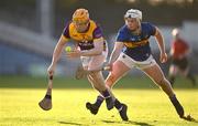 2 February 2025; Simon Donohoe of Wexford in action against Darragh McCarthy of Tipperary during the Allianz Hurling League Division 1A match between Tipperary and Wexford at FBD Semple Stadium in Thurles, Tipperary. Photo by Brendan Moran/Sportsfile