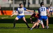 2 February 2025; Paidi O'Shea of Carlow in action against Jamie Barron, left, and Charlie Treen of Waterford during the Allianz Hurling League Division 1B match between Carlow and Waterford at Netwatch Cullen Park in Carlow. Photo by Stephen Marken/Sportsfile