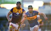 2 February 2025; Robert Doyle of Tipperary, right, in a race for possession with Jack O’Connor of Wexford during the Allianz Hurling League Division 1A match between Tipperary and Wexford at FBD Semple Stadium in Thurles, Tipperary. Photo by Brendan Moran/Sportsfile
