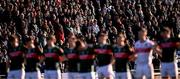 2 February 2025; Spectators and Mayo players stand for the playing of Amhrán na bhFiann before the Allianz Football League Division 1 match between Mayo and Galway at Hastings Insurance MacHale Park in Castlebar, Mayo. Photo by Piaras Ó Mídheach/Sportsfile