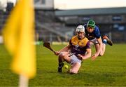 2 February 2025; Jack Redmond of Wexford is tackled by Brian McGrath of Tipperary during the Allianz Hurling League Division 1A match between Tipperary and Wexford at FBD Semple Stadium in Thurles, Tipperary. Photo by Brendan Moran/Sportsfile