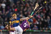 2 February 2025; Jake Morris of Tipperary in action against Charlie McGuckin of Wexford during the Allianz Hurling League Division 1A match between Tipperary and Wexford at FBD Semple Stadium in Thurles, Tipperary. Photo by Brendan Moran/Sportsfile