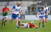 2 February 2025; Chris Nolan of Carlow in action against Sean Walsh, left, and Ian Kenny of Waterford during the Allianz Hurling League Division 1B match between Carlow and Waterford at Netwatch Cullen Park in Carlow. Photo by Stephen Marken/Sportsfile