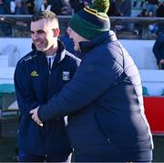 2 February 2025; Cavan manager Raymond Galligan, left, shakes hands with Meath manager Robbie Brennan after the Allianz Football League Division 2 match between Meath and Cavan at Páirc Tailteann in Navan, Meath. Photo by Tyler Miller/Sportsfile