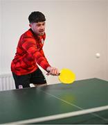 3 February 2025; Derry City's Adam O'Reilly plays table tennis as players relax before a team meeting at their new training facility, the Owenbeg Derry GAA Centre, in Dungiven, Derry. Photo by Stephen McCarthy/Sportsfile
