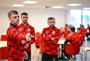 3 February 2025; Derry City's Ciaron Harkin plays darts as players relax before a team meeting at their new training facility, the Owenbeg Derry GAA Centre, in Dungiven, Derry. Photo by Stephen McCarthy/Sportsfile