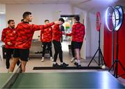 3 February 2025; Derry City's Patrick Hoban plays darts as players relax before a team meeting at their new training facility, the Owenbeg Derry GAA Centre, in Dungiven, Derry. Photo by Stephen McCarthy/Sportsfile