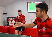 3 February 2025; Derry City's Ben Doherty watches Danny Mullen play table tennis as players relax before a team meeting at their new training facility, the Owenbeg Derry GAA Centre, in Dungiven, Derry. Photo by Stephen McCarthy/Sportsfile