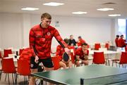 3 February 2025; Derry City's Sam Todd plays table tennis as players relax before a team meeting at their new training facility, the Owenbeg Derry GAA Centre, in Dungiven, Derry. Photo by Stephen McCarthy/Sportsfile