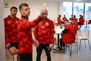 3 February 2025; Derry City's goalkeeper Brian Maher, right, watches on as team-mates play darts as players relax before a team meeting at their new training facility, the Owenbeg Derry GAA Centre, in Dungiven, Derry. Photo by Stephen McCarthy/Sportsfile