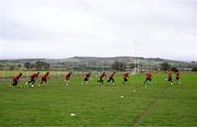 3 February 2025; Derry City players during a pitch training session at their new training facility, the Owenbeg Derry GAA Centre, in Dungiven, Derry. Photo by Stephen McCarthy/Sportsfile