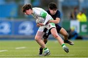 4 February 2025; Oscar Sugrue-Lynch of Gonzaga College in action against Sean Lee of Wesley College during the Bank of Ireland Leinster Rugby Boys Schools Junior Cup First Round match between Wesley College and Gonzaga College at Energia Park in Dublin. Photo by Shauna Clinton/Sportsfile