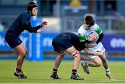 4 February 2025; Cian Benson of Gonzaga College is tackled by Marius Pienaar of Wesley College during the Bank of Ireland Leinster Rugby Boys Schools Junior Cup First Round match between Wesley College and Gonzaga College at Energia Park in Dublin. Photo by Shauna Clinton/Sportsfile
