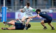 4 February 2025; Cian Benson of Gonzaga College is tackled by Sean Lee of Wesley College during the Bank of Ireland Leinster Rugby Boys Schools Junior Cup First Round match between Wesley College and Gonzaga College at Energia Park in Dublin. Photo by Shauna Clinton/Sportsfile