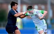 4 February 2025; Daniel Murphy of Gonzaga College in action against Malachy Ngawini of Wesley College during the Bank of Ireland Leinster Rugby Boys Schools Junior Cup First Round match between Wesley College and Gonzaga College at Energia Park in Dublin. Photo by Shauna Clinton/Sportsfile