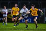 6 February 2025; Eamon Brown of Ulster University in action against Tom Prior of DCU Dóchas Éireann during the Electric Ireland Higher Education GAA Sigerson Cup semi-final match between Ulster University and DCU Dóchas Éireann at Kingspan Breffni Park in Cavan. Photo by Tyler Miller/Sportsfile