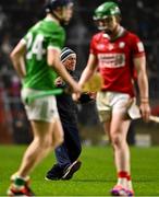 1 February 2025; Limerick manager John Kiely on the pitch remonstrating with referee Seán Stack, not pictured, before he was shown the yellow card during the Allianz Hurling League Division 1A match between Cork and Limerick at SuperValu Páirc Uí Chaoimh in Cork. Photo by Piaras Ó Mídheach/Sportsfile