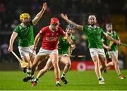 1 February 2025; Ciarán Joyce of Cork in action against Limerick players, from left, Séamus Flanagan, Eddie Stokes and Cian Lynch during the Allianz Hurling League Division 1A match between Cork and Limerick at SuperValu Páirc Uí Chaoimh in Cork. Photo by Piaras Ó Mídheach/Sportsfile