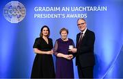 7 February 2025; Margaret Byrne of Mount Leinster Rangers GAA, Carlow, centre, is presented with the Leinster award by Uachtarán Chumann Lúthchleas Gael Jarlath Burns, right, and AIB chief customer officer Orlaith Ryan during the Gradaim an Uachtaráin at Croke Park in Dublin. Photo by Seb Daly/Sportsfile
