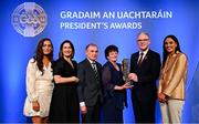 7 February 2025; The McGrath Family of Sarsfield GAA Club, Galway, are presented with the Dermot Early Family Award by Uachtarán Chumann Lúthchleas Gael Jarlath Burns and AIB chief customer officer Orlaith Ryan during the Gradaim an Uachtaráin at Croke Park in Dublin. Photo by Seb Daly/Sportsfile