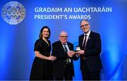 7 February 2025; Martin Grogan of Roger Casements GAA Club, Warwickshire, centre, is presented with the International award by Uachtarán Chumann Lúthchleas Gael Jarlath Burns, right, and AIB chief customer officer Orlaith Ryan during the Gradaim an Uachtaráin at Croke Park in Dublin. Photo by Seb Daly/Sportsfile
