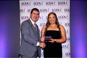 7 February 2025; Emma McMoran from the Coalisland club in Tyrone is presented with the Young Volunteer of the Year award by Ladies Gaelic Football Association President Mícheál Naughton at the 2024 LGFA National Volunteer of the Year awards ceremony at Croke Park in Dublin. Photo by Piaras Ó Mídheach/Sportsfile