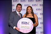 7 February 2025; Emma McMoran from the Coalisland club in Tyrone is presented with the Young Volunteer of the Year award by Ladies Gaelic Football Association President Mícheál Naughton at the 2024 LGFA National Volunteer of the Year awards ceremony at Croke Park in Dublin. Photo by Piaras Ó Mídheach/Sportsfile