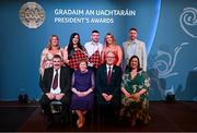 7 February 2025; Leinster award recipient Margaret Byrne of Mount Leinster Rangers GAA, Carlow, with family and Uachtarán Chumann Lúthchleas Gael Jarlath Burns during the Gradaim an Uachtaráin at Croke Park in Dublin. Photo by Seb Daly/Sportsfile