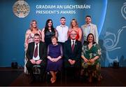 7 February 2025; Leinster award recipient Margaret Byrne of Mount Leinster Rangers GAA, Carlow, with family and Uachtarán Chumann Lúthchleas Gael Jarlath Burns during the Gradaim an Uachtaráin at Croke Park in Dublin. Photo by Seb Daly/Sportsfile