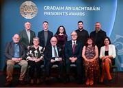 7 February 2025; International award recipient Martin Grogan of Roger Casements GAA Club, Warwickshire, with family and Uachtarán Chumann Lúthchleas Gael Jarlath Burns during the Gradaim an Uachtaráin at Croke Park in Dublin. Photo by Seb Daly/Sportsfile