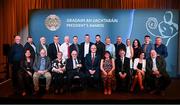 7 February 2025; International award recipient Martin Grogan of Roger Casements GAA Club, Warwickshire, with family and Uachtarán Chumann Lúthchleas Gael Jarlath Burns during the Gradaim an Uachtaráin at Croke Park in Dublin. Photo by Seb Daly/Sportsfile