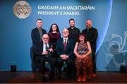 7 February 2025; International award recipient Martin Grogan of Roger Casements GAA Club, Warwickshire, with family and Uachtarán Chumann Lúthchleas Gael Jarlath Burns during the Gradaim an Uachtaráin at Croke Park in Dublin. Photo by Seb Daly/Sportsfile