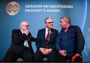 7 February 2025; International award recipient Martin Grogan of Roger Casements GAA Club, Warwickshire, left, and Uachtarán Chumann Lúthchleas Gael Jarlath Burns, centre, during the Gradaim an Uachtaráin at Croke Park in Dublin. Photo by Seb Daly/Sportsfile