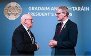 7 February 2025; International award recipient Martin Grogan of Roger Casements GAA Club, Warwickshire, left, and Uachtarán Chumann Lúthchleas Gael Jarlath Burns during the Gradaim an Uachtaráin at Croke Park in Dublin. Photo by Seb Daly/Sportsfile