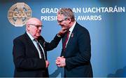7 February 2025; International award recipient Martin Grogan of Roger Casements GAA Club, Warwickshire, left, and Uachtarán Chumann Lúthchleas Gael Jarlath Burns during the Gradaim an Uachtaráin at Croke Park in Dublin. Photo by Seb Daly/Sportsfile