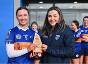 8 February 2025; Electric Ireland Player of the Match Emma Fitzgerald of ATU Galway is presented with her award by Chairperson of CCAO Eimear Goland after her side's victory in the Electric Ireland Ashling Murphy Cup final match between Queens University Belfast 2 and ATU Galway at the University of Galway Connacht GAA AirDome in Bekan, Mayo. Photo by Piaras Ó Mídheach/Sportsfile