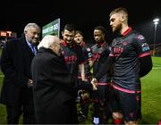 7 February 2025; President of Ireland Michael D Higgins, in the company of FAI President Paul Cooke is introduced to Conor Keeley by Drogheda United captain Ryan Brennan before the 2025 Men's FAI President's Cup final match between Shelbourne and Drogheda United at Tolka Park in Dublin. Photo by Stephen McCarthy/Sportsfile