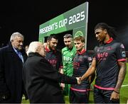 7 February 2025; President of Ireland Michael D Higgins, in the company of FAI President Paul Cooke is introduced to Aaron Harper-Bailey by Drogheda United captain Ryan Brennan before the 2025 Men's FAI President's Cup final match between Shelbourne and Drogheda United at Tolka Park in Dublin. Photo by Stephen McCarthy/Sportsfile