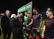 7 February 2025; President of Ireland Michael D Higgins, in the company of FAI President Paul Cooke is introduced to Aaron Harper-Bailey by Drogheda United captain Ryan Brennan before the 2025 Men's FAI President's Cup final match between Shelbourne and Drogheda United at Tolka Park in Dublin. Photo by Stephen McCarthy/Sportsfile