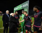 7 February 2025; President of Ireland Michael D Higgins, in the company of FAI President Paul Cooke is introduced to Owen Lambe by Drogheda United captain Ryan Brennan before the 2025 Men's FAI President's Cup final match between Shelbourne and Drogheda United at Tolka Park in Dublin. Photo by Stephen McCarthy/Sportsfile