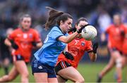8 February 2025; Kate Sullivan of Dublin on her way to scoring her side's first goal despite the attention of Róisin Mulligan of Armagh during the Lidl Ladies National Football League Division 1 match between Dublin and Armagh at Parnell Park in Dublin. Photo by Stephen McCarthy/Sportsfile