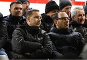 7 February 2025; League of Ireland director Mark Scanlon and FAI chief football officer Marc Canham, right, during the 2025 Men's FAI President's Cup final match between Shelbourne and Drogheda United at Tolka Park in Dublin. Photo by Stephen McCarthy/Sportsfile
