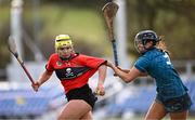 8 February 2025; Clodagh Finn of UCC in action against Emma O'Byrne of TUD during the Electric Ireland Ashbourne Cup semi-final match between University College Cork and TU Dublin at the University of Galway Connacht GAA AirDome in Bekan, Mayo. Photo by Piaras Ó Mídheach/Sportsfile