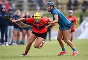 8 February 2025; Clodagh Finn of UCC in action against Emma O'Byrne of TUD during the Electric Ireland Ashbourne Cup semi-final match between University College Cork and TU Dublin at the University of Galway Connacht GAA AirDome in Bekan, Mayo. Photo by Piaras Ó Mídheach/Sportsfile