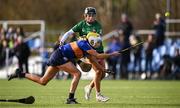 8 February 2025; Ava Lynskey of ATU Galway in action against Cara McIvor of QUB2 during the Electric Ireland Ashling Murphy Cup final match between Queens University Belfast 2 and ATU Galway at the University of Galway Connacht GAA AirDome in Bekan, Mayo. Photo by Piaras Ó Mídheach/Sportsfile