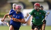 8 February 2025; Abbey Massey of ATU Galway in action against Cati Loughran of QUB2 during the Electric Ireland Ashling Murphy Cup final match between Queens University Belfast 2 and ATU Galway at the University of Galway Connacht GAA AirDome in Bekan, Mayo. Photo by Piaras Ó Mídheach/Sportsfile